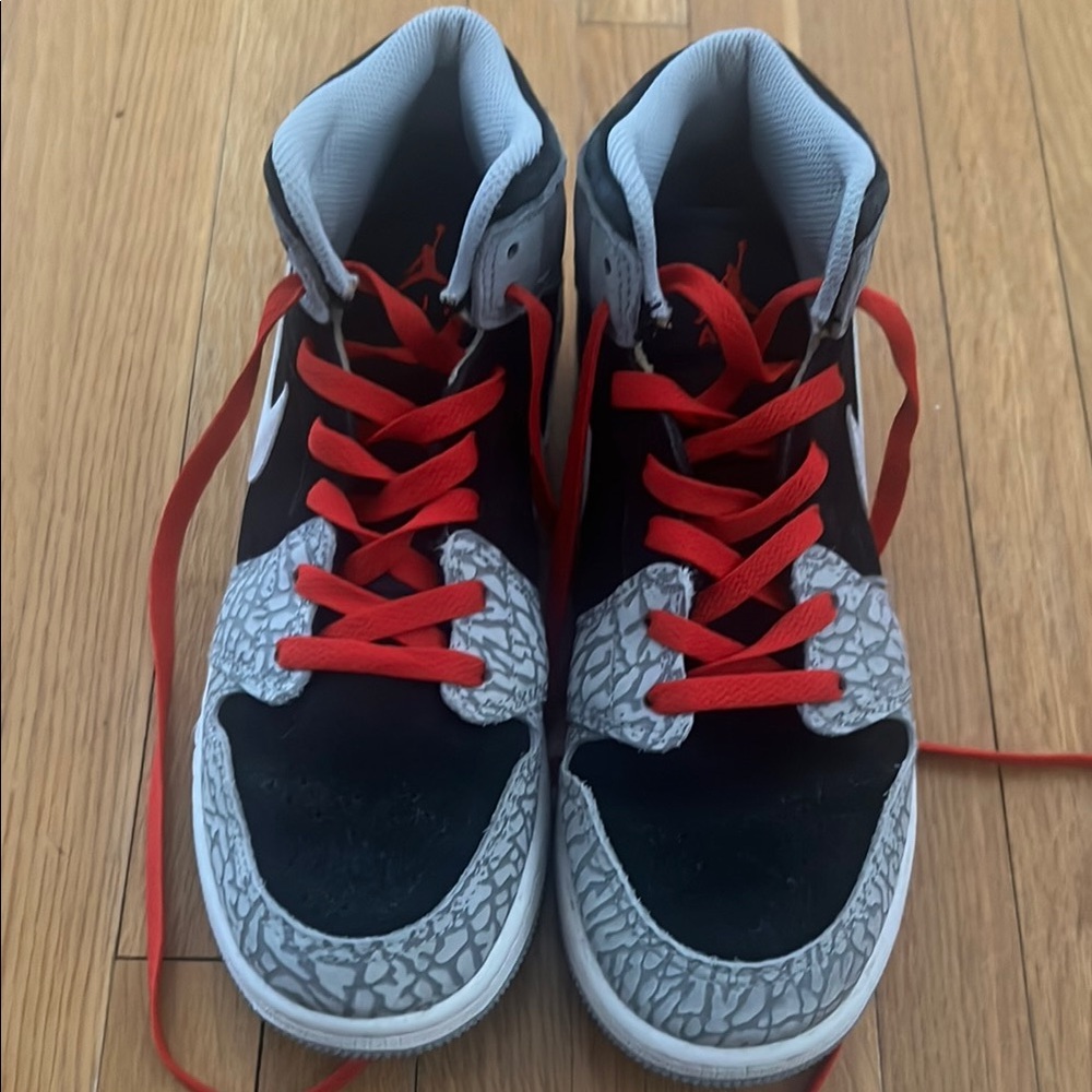 Kids Black and Red Nike Shoes